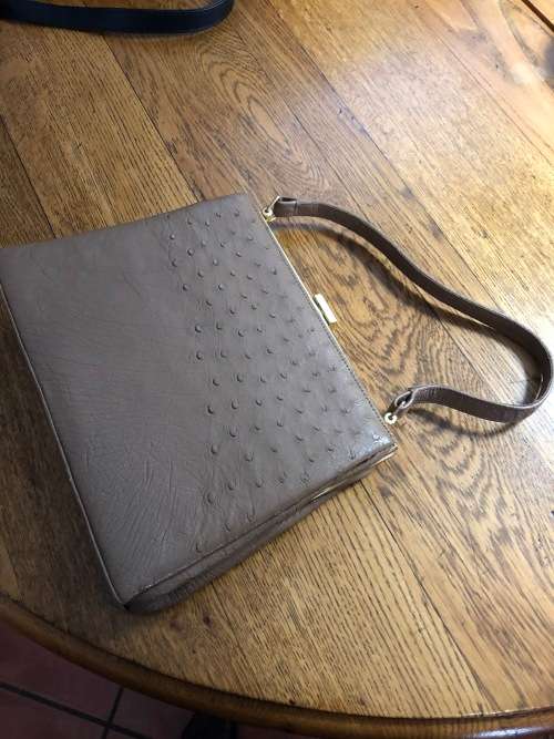 Genuine ostrich skin handbag in brown